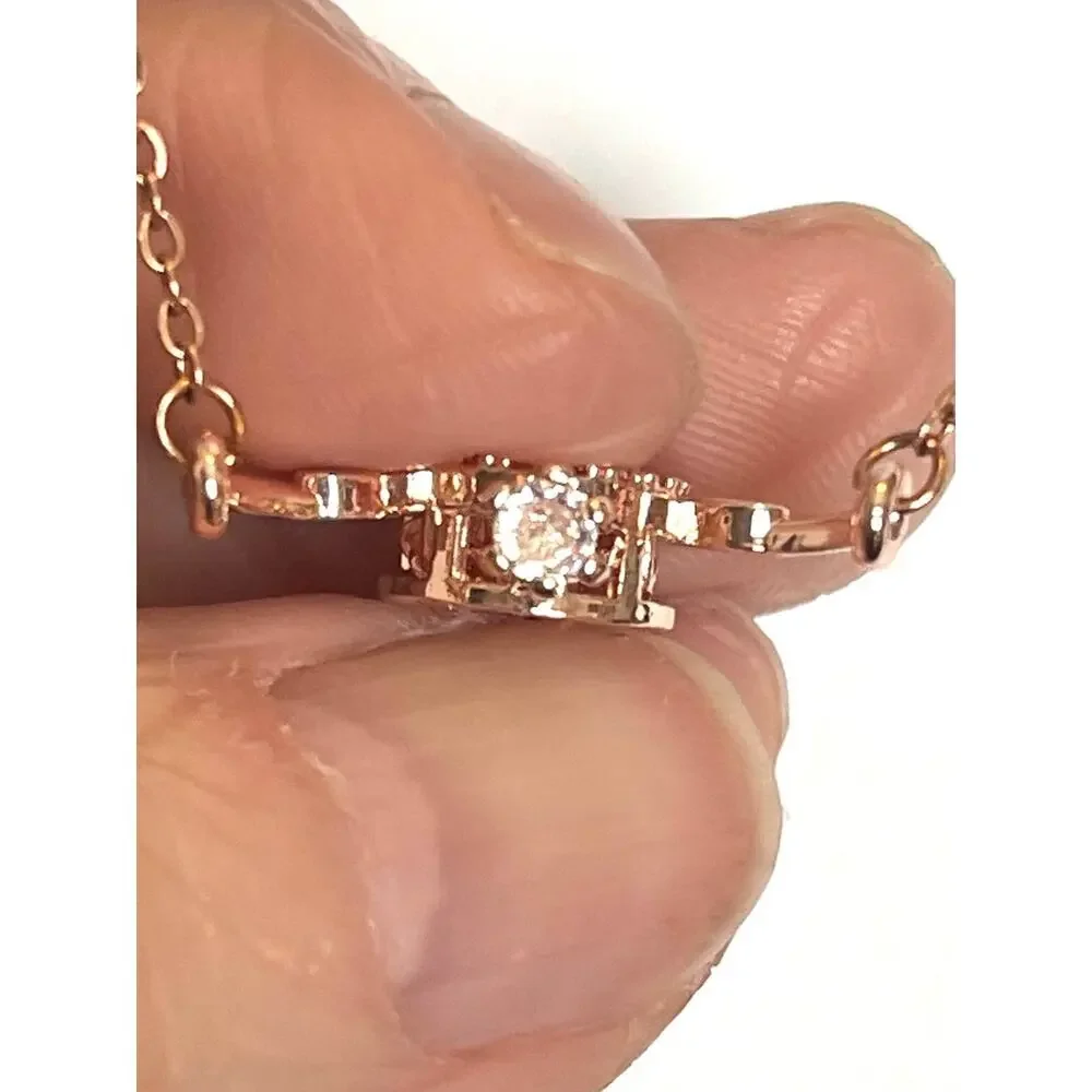 Rose Gold Over Stainless Angel Wing Trimbler Necklace, CZ’s Lobster Claw Clasp